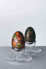colorful easter eggs on egg holders, happy easter