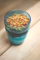 Vanilla Ice Cream Parfait with Granola Topping in Blue Tumbler