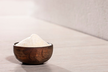 Hydrolyzed collagen protein in wooden bowl