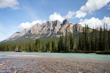 A breathtaking mountain across the river in Alberta, Canada
