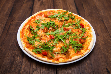 Classic Italian pizza on a wooden table