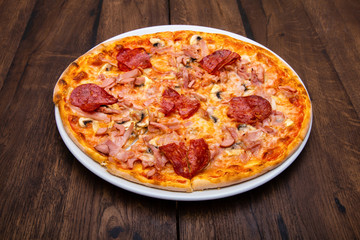 Classic Italian pizza on a wooden table