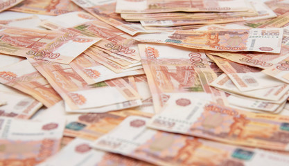 Background of many five -thousand ruble bills.