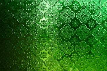 Green glass with pattern background. Abstract Green background vintage texture. Multicolored stained glass In churches in temples background.