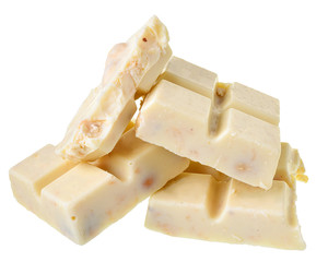 Broken white chocolate with whole hazelnut nuts Isolated