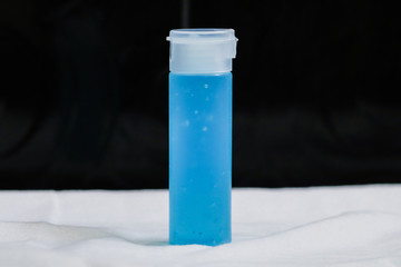 Alcohol gel and alcohol base  hand-washing. Preventive measures against coronavirus ( Sars-CoV-2, Covid-19) infection with antibacterial hand sanitizer gel for anti Bacteria and virus in black backgro