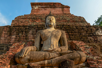 Old big Buddha statue in archaeological site Sukhothai, Thailand