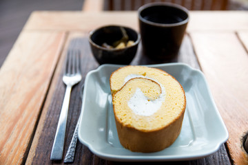 Roll cake with tea in the morning