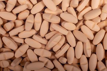 pills lie on table background Drugs, painkillers, colds and other cures close-up