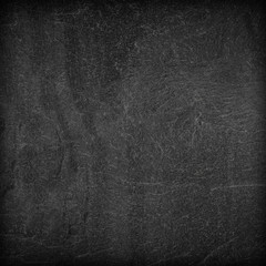 Dark grey black slate background or texture.