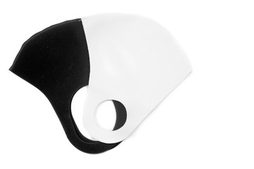 Protective black and white face mask on black background