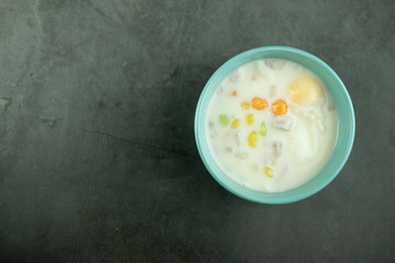 Thai sweets and colorful ball flour in blue bowl