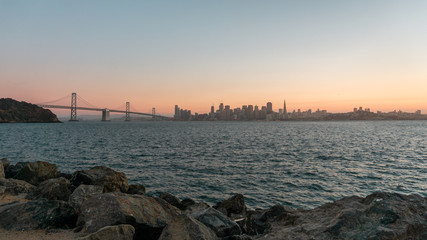 San Francisco Bay sunset with city skyline and Bay Bridge view from Treasure Island