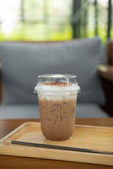 Iced coffee mocha in clear plastic glass