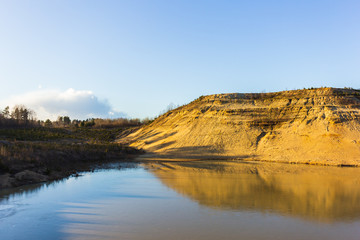 sand mountain quarry and water lake landscape