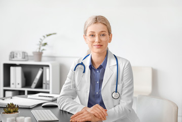 Portrait of female doctor in clinic