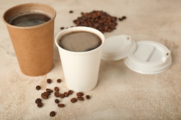 Takeaway coffee cups on table