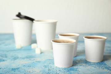 Takeaway coffee cups on table
