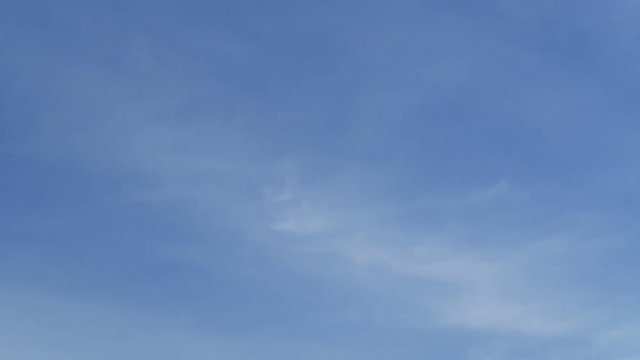 Beautiful white smoky fluffy cirrus & cumulus clouds on tropical summer or spring bright blue sky background in sunny day TimpLapse for transitional & meditative motion vdo or nature related project