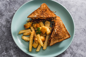 plant-based food, vegan club sandwichs with veggie patties and chips