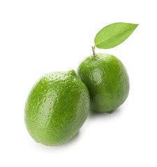 Green limes on white background