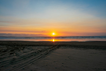 Obraz premium Sunset at Ninety Mile Beach, New Zealand