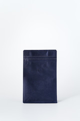 dark blue paper ziplock package with valve for roasted coffee bean on white background
