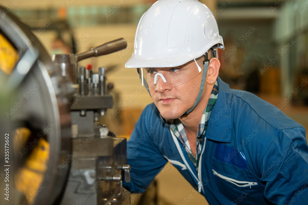 Poster engineer worker in factory on the machine,factory engineering conceptual.