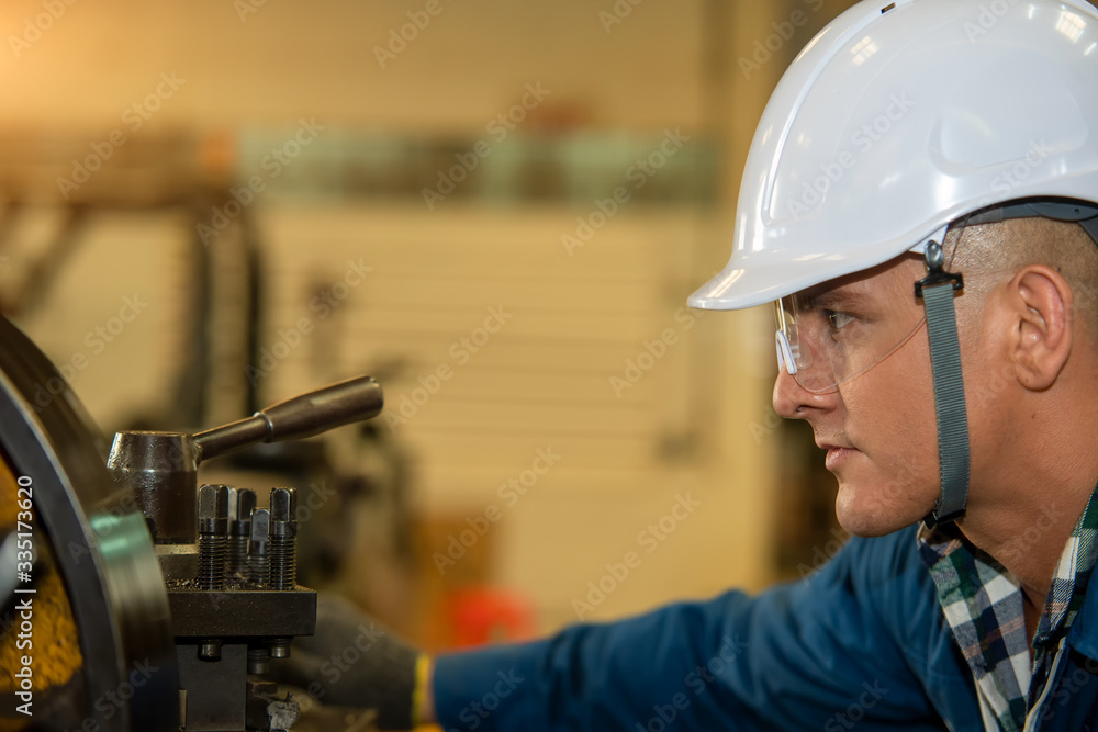 Poster engineer worker in factory on the machine,factory engineering conceptual.