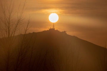 Sunrise from beyond the mountains