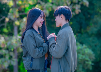 Fototapeta premium Lesbian lovers show love for each other. LGBT couples are Asian women or lesbian couples showing their friendship, love and bond in LGBT style.