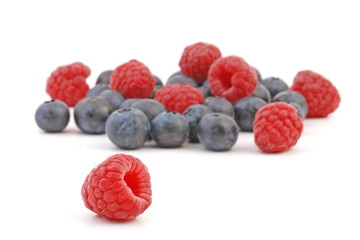 Fresh Berries on white background.  Ripe Sweet Strawberry, Raspberry, Blueberry, Blackberry. Healthy fruits.  
