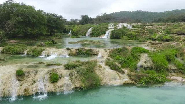 A surprising snapshot of the drone in the fall in Salalah, Ain Darbat, Sultanate of Oman