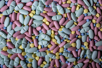 pills background. Drugs, painkillers, colds and other medicines closeup