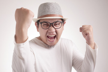 Fototapeta premium Surprised Happy Asian Man, Winning Victory Celebration