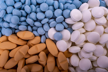 pills background. Drugs, painkillers, colds and other medicines close-up