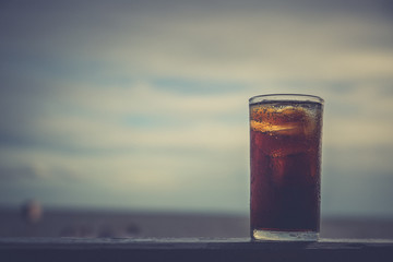 Cola with ice in the glass ready to drink for refresh