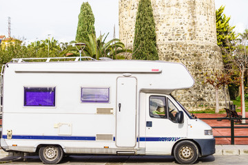 Caravan at old tower, Algarrobo town, Spain