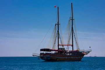 Old pirate ship sailing in the deep sea