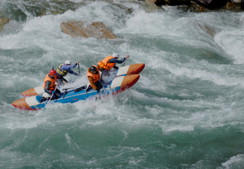 Extreme catamaran rafting on the mountain rivers of the Tien Shan