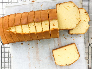 Homemade butter cake on stainless steel tray. 