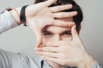 Obraz premium Photo sign made by human hands