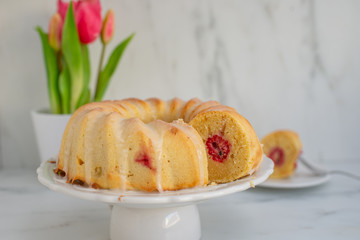Raspberry Lemon Cake with tulips