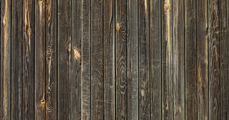 brown old wooden boards fence background. template for design