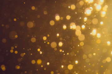 Dark Abstract Gold bokeh sparkle on black