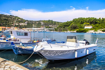 Fototapeta na wymiar Corfu island beaches, waterfront, sea, havens, bays, boats, Greece