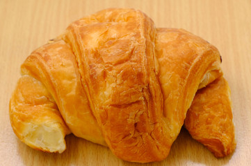 Breakfast served, croissants. Balanced diet.
