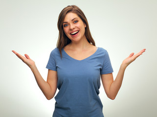 Young woman wearing blue t-shirt holding two empty hands.