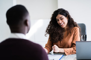 Female Manager Interviewing A Male Applicant