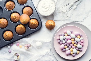 Process of preparation glazed Easter cupcakes